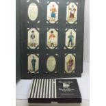 An album of cigarette cards and a box of Marcovitch cigarettes