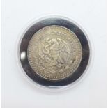 A 1oz fine silver 1985 Mexican Liberty coin, 31g