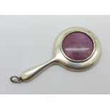 A miniature silver mirror