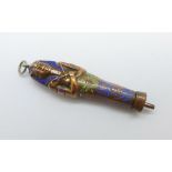 A 19th Century novelty enamel pencil in the form of a Pharaoh, 6cm