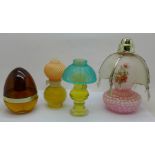 Avon perfume bottles, some with contents