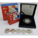 A 2016 Team GB silver proof 50p coin and five 2018 Isle of Man 50p coins