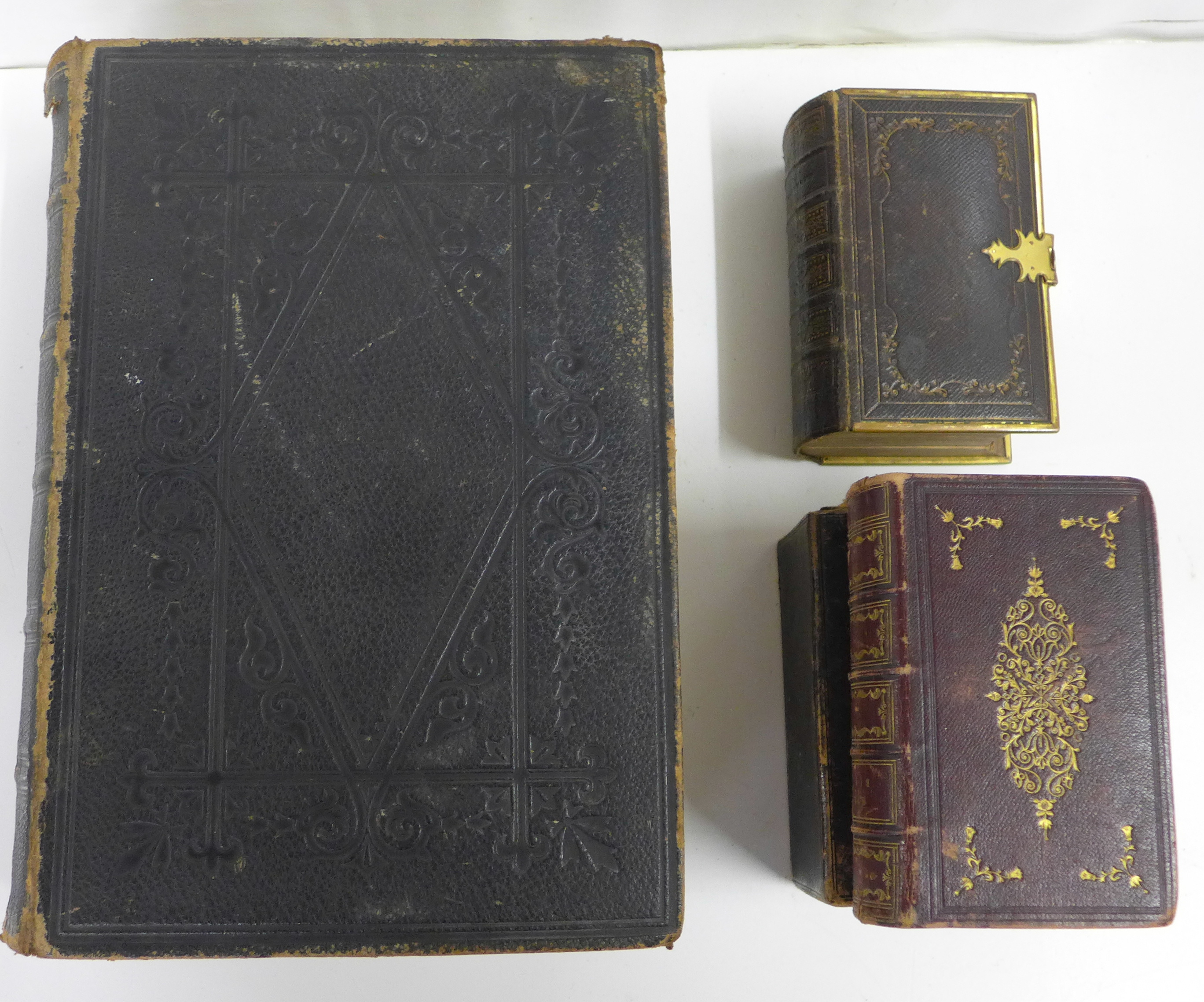 A Holy Bible, 1872 and two prayer books **PLEASE NOTE THIS LOT IS NOT ELIGIBLE FOR POSTING AND