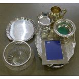 A collection of silver plated items including a gallery tray, boxed, a plated holder, photograph