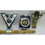 Three car badges, National Association of Retired Police Officers and two others