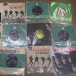 Twenty-one The Beatles 7" vinyl singles