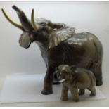 A Royal Doulton model of an elephant and a larger model of an elephant