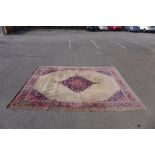 A large beige ground rug