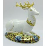 A Royal Crown Derby White Hart paperweight, 1180 of 2000, gold stopper, boxed and with certificate
