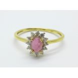 A silver gilt, cabochon ruby and zircon ring, S