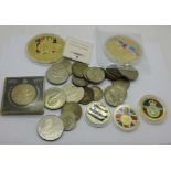 An RAF commemorative £5 coin, two other £5 coins, two large medallions and other coins including a