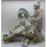 A Lladro figure group and stand, a/f, (swan figure restored) 30.5cm