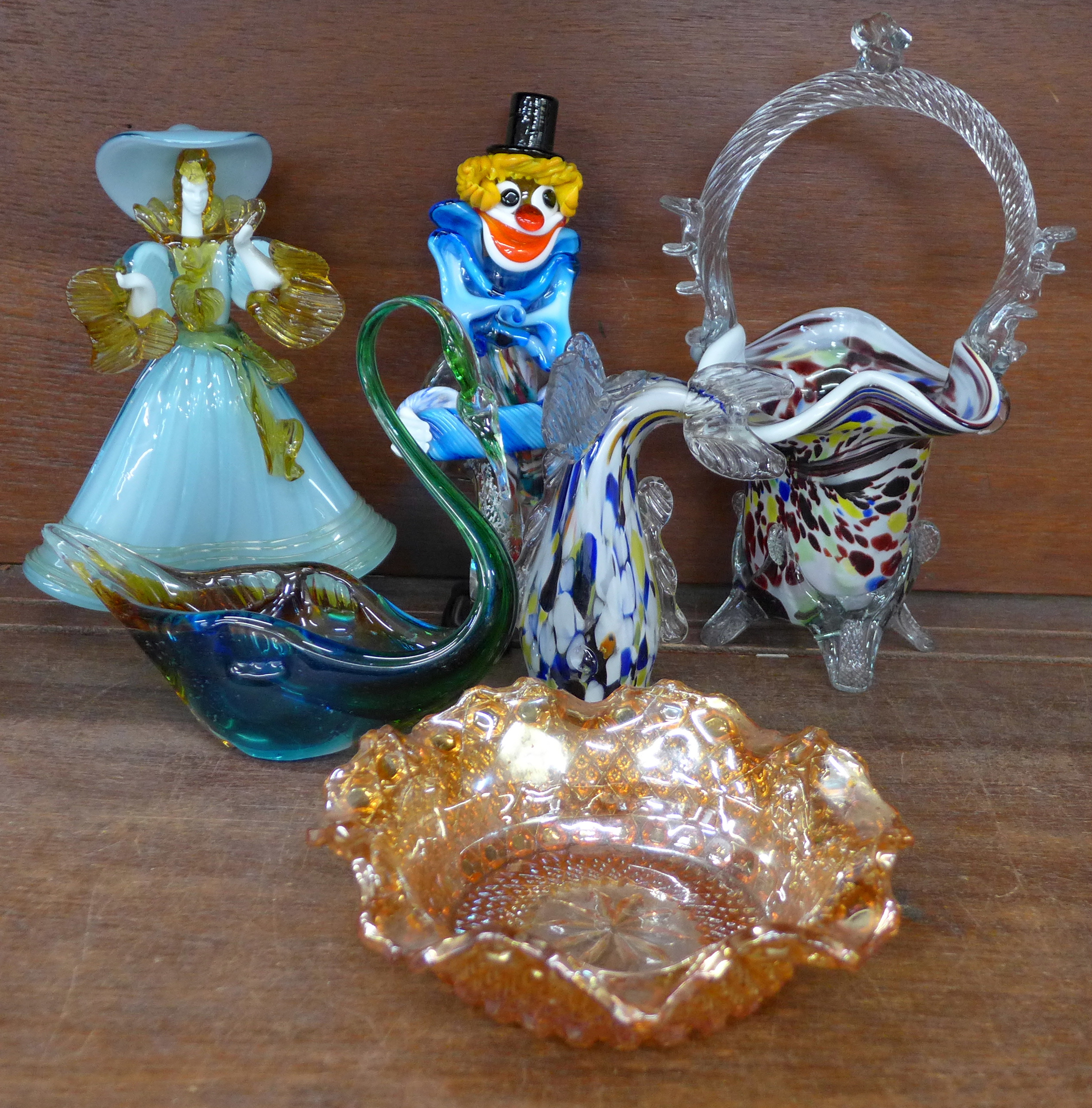 A Murano glass clown, lady, basket, fish vase and other glass