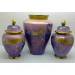 A Moorland Chelsea Works Burslem art pottery vase and matching pair of lidded vases decorated with