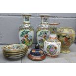 A pair of Chinese vases, a single Chinese vase, a vase with lid and five saucers **PLEASE NOTE