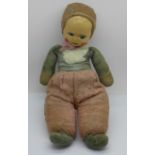 An early 20th century doll with composition head