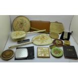 A collection of items including compacts and brush/mirror set, etc.
