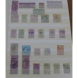 Stamps; stockbook of Revenue stamps, including loose stamps and full documents