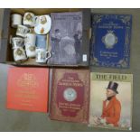 A collection of Royal Copenhagen items including commemorative mugs and books **PLEASE NOTE THIS LOT