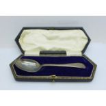 A silver spoon, cased, 32g