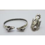 A silver dragon ring and a silver ram's head bracelet, ring size Q