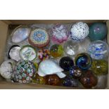 A collection of glass paperweights, two Millefiori, M'dina and others