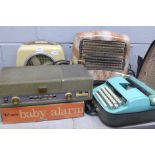 An Electrical Audio Reproducers All Transistor Radio-Pakagram, two heaters, a typewriter, a Tri-onic