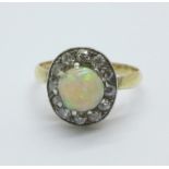 An 18ct gold, opal and diamond cluster ring, 3g, M