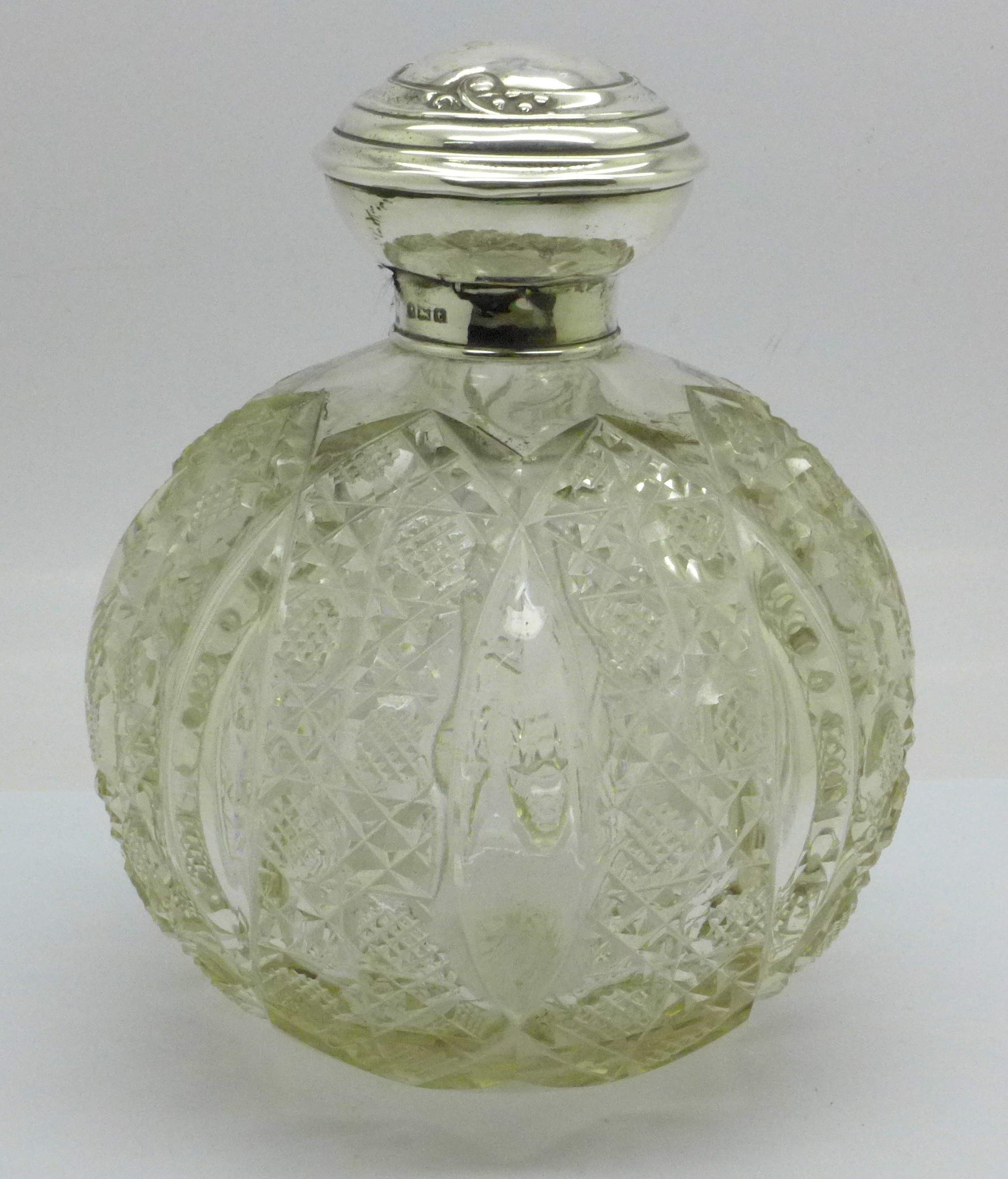 A silver topped cut glass scent, Birmingham 1918, top a/f