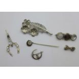 Five brooches and a stick pin, all test as silver, small bow brooch lacking one 'stone'