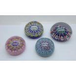 Four Millefiori glass paperweights