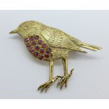 A hallmarked 9ct gold robin brooch set with rubies, 5g, height 3cm