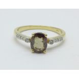 A 14ct gold, colour change garnet ring with diamond shoulders, with certificate, 2.6g, N