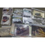 A collection of 160+ railway steam and electric train photographs, eighteen postcards and cards,