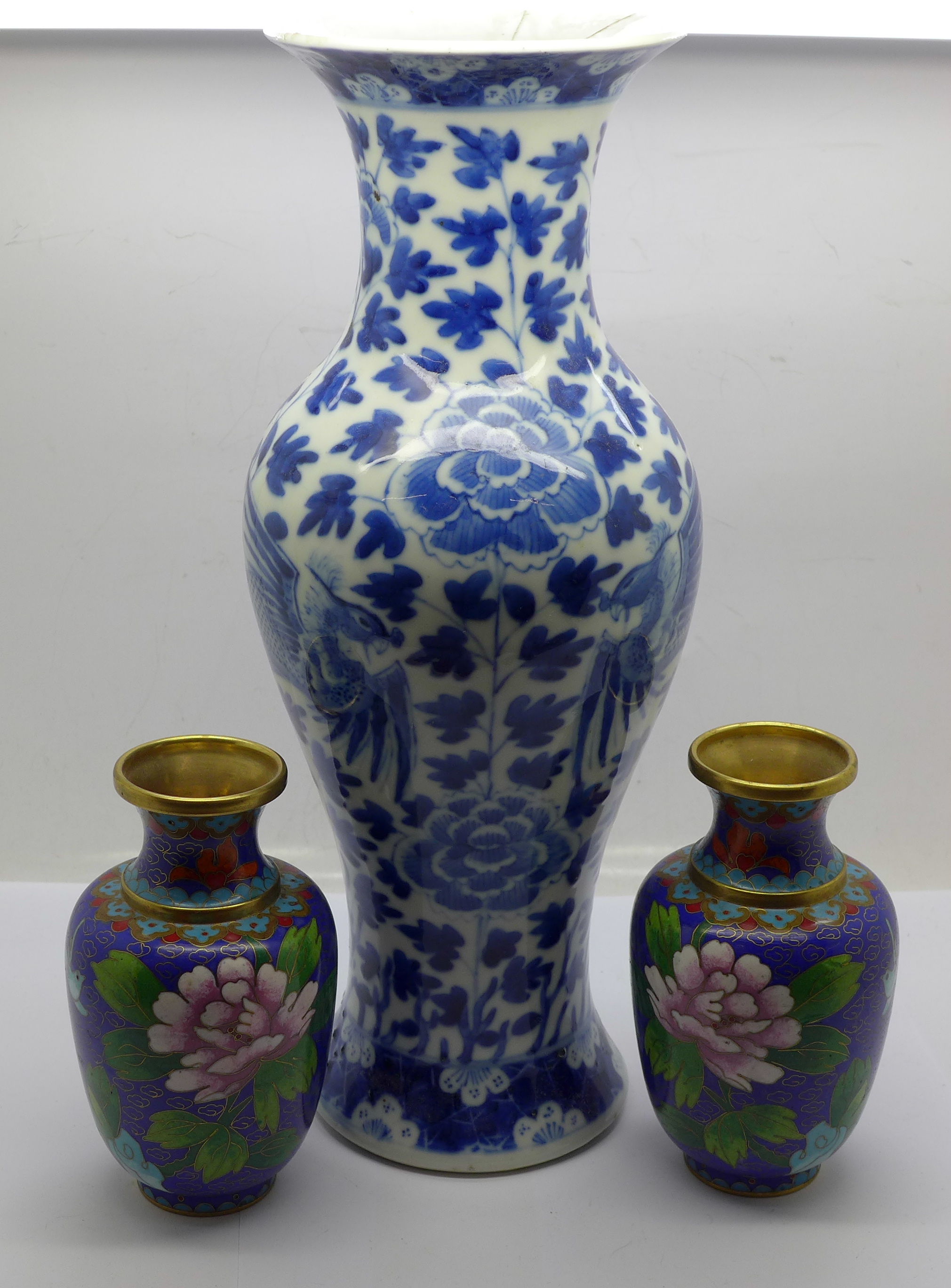 A Chinese blue and white vase with four character mark to base, rim restored, 31cm and a pair of