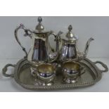 A silver plated teapot, coffee pot, jug and sugar bowl on a tray **PLEASE NOTE THIS LOT IS NOT