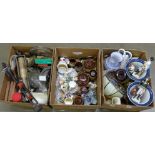 Three boxes of assorted items including pottery, silver plate, metal ware, jugs, figures, lampshade,