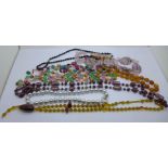 Eight glass bead necklaces