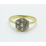 An 18ct gold, white stone daisy cluster ring, 2g, M