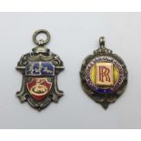 Two silver and enamel fob medals with gold applied decoration, Rolls Royce C.J. Football Cup