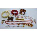 Vintage jewellery including a Bakelite bangle and a dog brooch, etc.