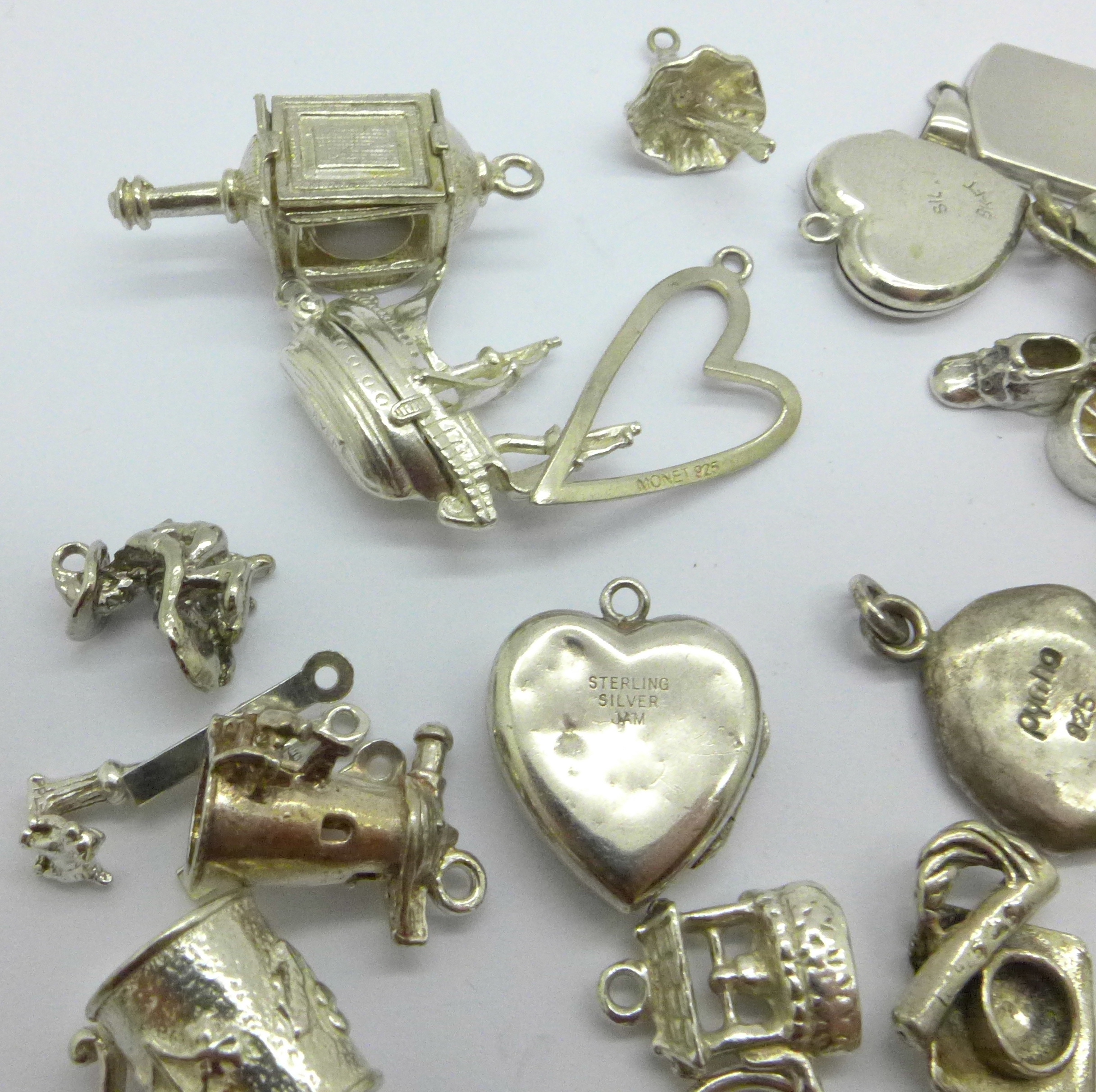 A collection of silver and white metal charms, total weight 83g, one locket marked 'SIL BK-FT' - Image 2 of 5