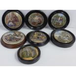 Seven 19th Century framed Prattware pot lids, one a/f