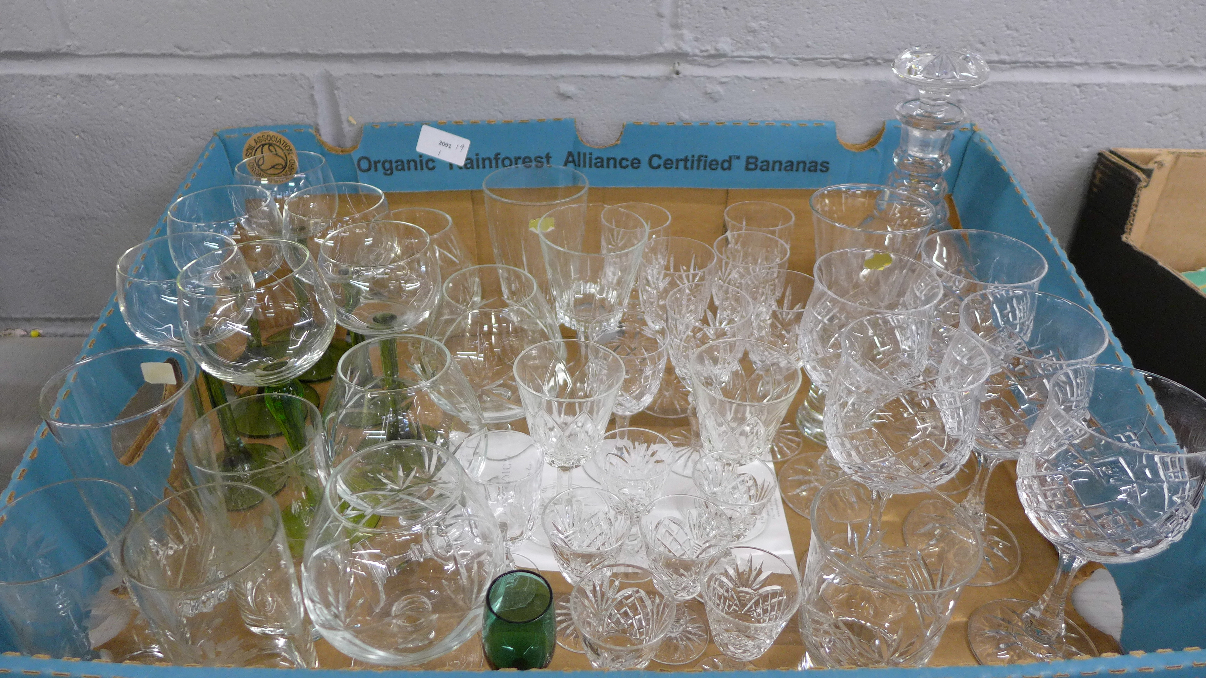 A collection of glassware including crystal, (40 approximately), a crystal decanter, etc. **PLEASE