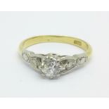 An 18ct gold, platinum and diamond solitare ring, 2.2g, K