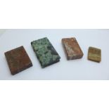 Four agate paperweights in the form of books, largest 51mm x 92mm, (some small chips to the edges)