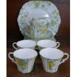 A 1930's Royal Albert tea service, four cups, saucers and side plates, a sandwich plate, cream and