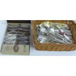 A collection of cutlery including insignia, silver plate, 24 pieces, four fish knives, a set of