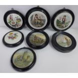 Seven 19th Century framed Prattware pot lids