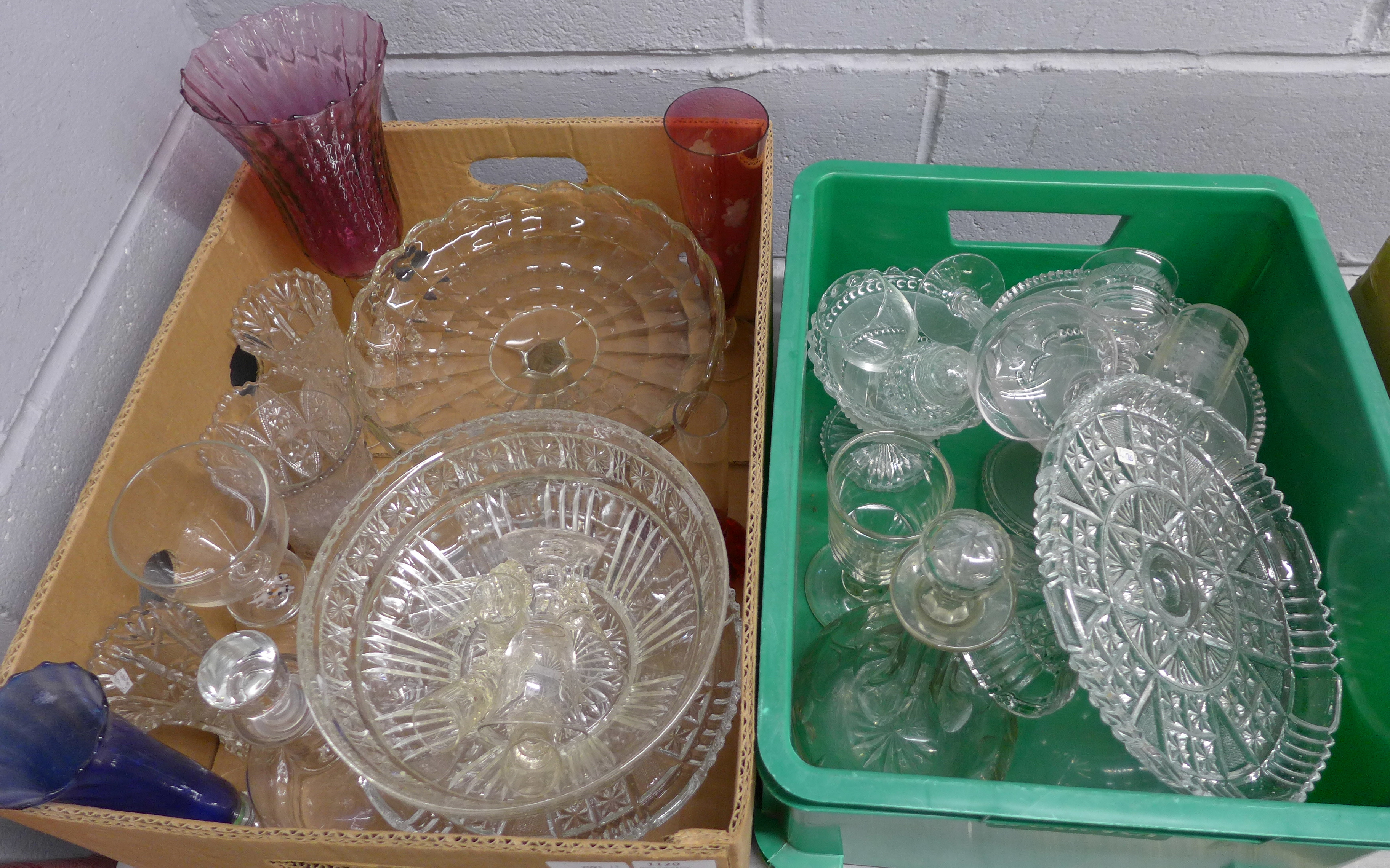 Two boxes of glassware including cut glass and coloured glass, an etched glass decanter, etc. **
